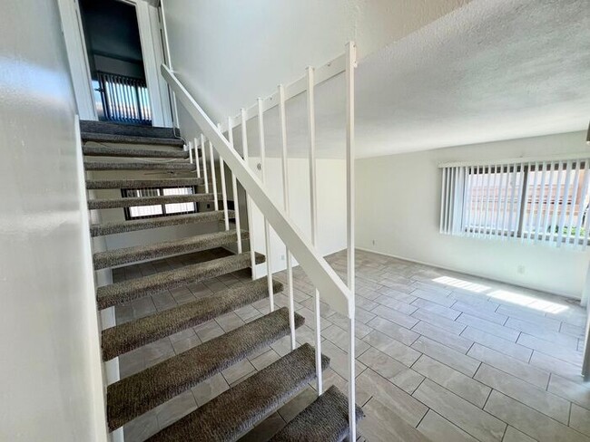 Building Photo - Spacious 2BR/1.5BA Townhome with A/C, Parking & Luxury Community Amenities