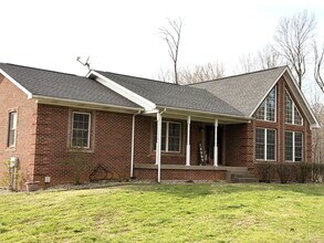 Building Photo - Gorgeous brick home with room to roam!