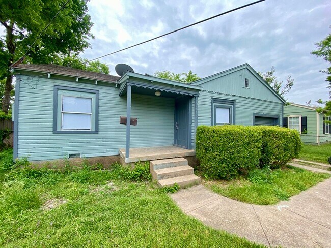 Primary Photo - Charming home with a large fenced backyard...
