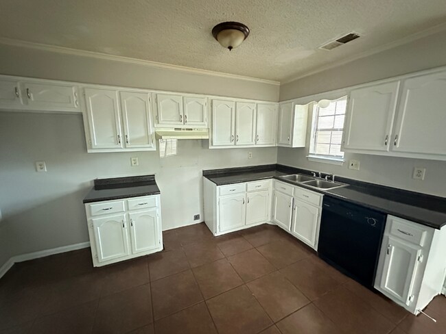Building Photo - MOVE-IN READY! 3BR/2BA in Quiet Cove | Brick Fireplace | Fenced Yard & Patio!