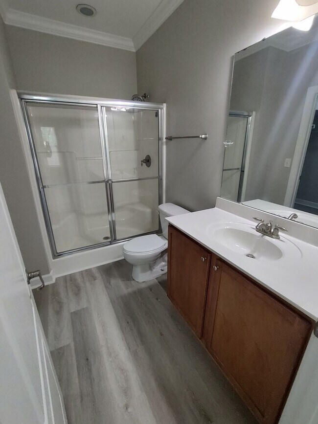 Building Photo - BRAND NEW FLOORING & FRESH PAINT - 3 Bedroom/2.5 Bath Townhome with garage in Wild Wing!