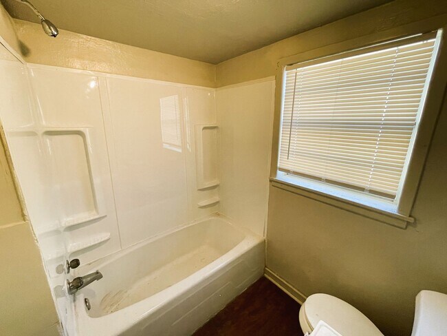 Building Photo - Spacious Home Featuring Two Living Areas I...