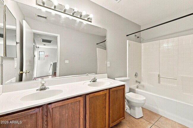 Building Photo - 8776 W Cherry Hills Dr