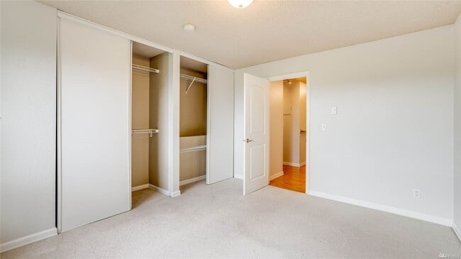 Building Photo - Light filled top floor condo.