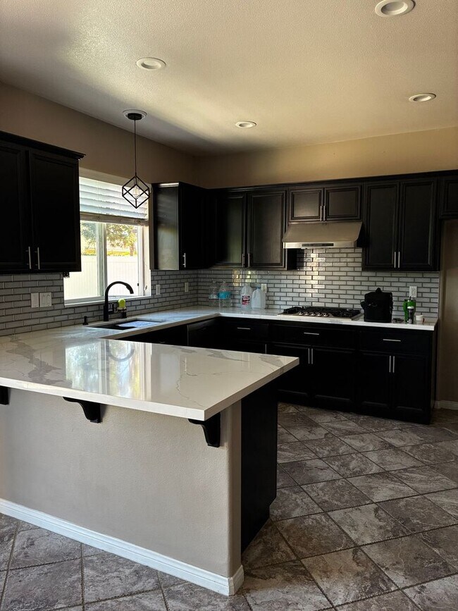 Building Photo - Smart 3-Bedroom Home with Solar & 2-Car Ga...