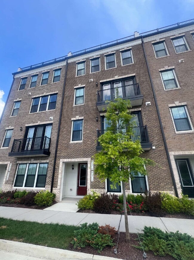 Primary Photo - Brand-New Luxury 3BR Townhome-Style Condo ...