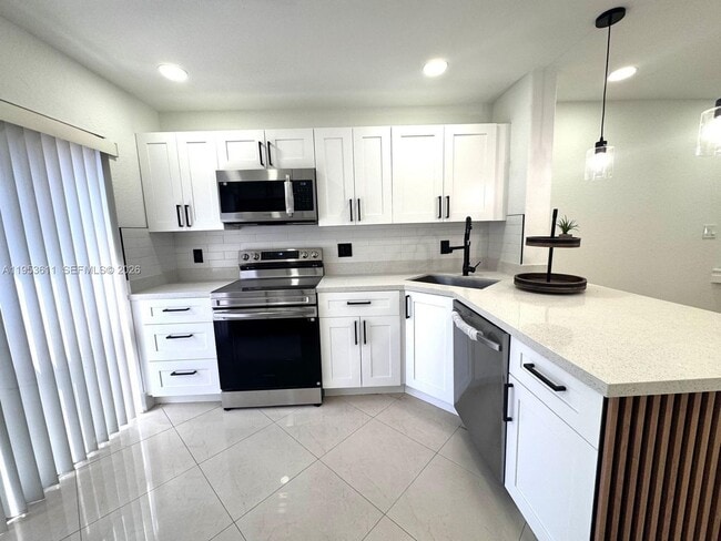 Building Photo - 5655 NW 109th Ave