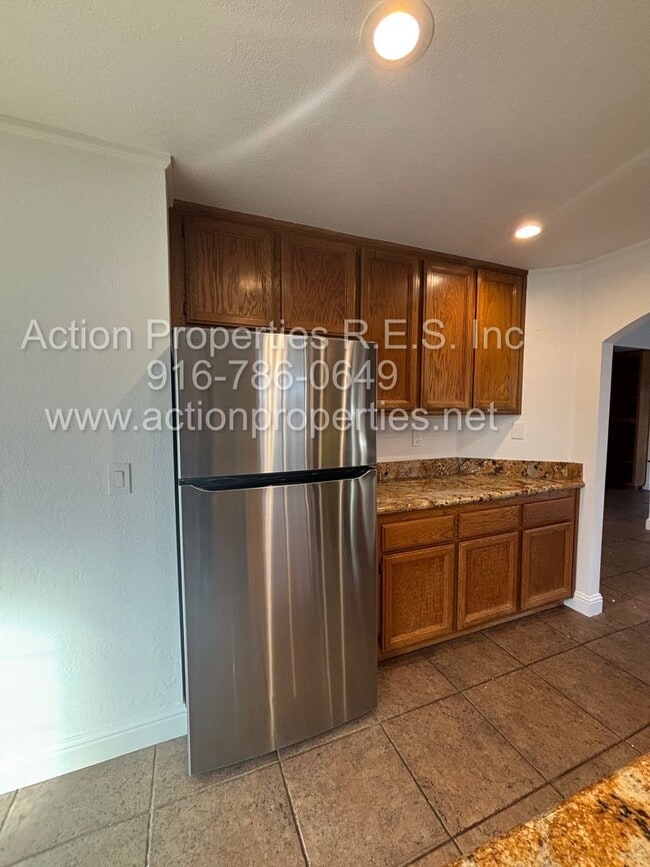 Building Photo - Action Properties RES Inc: offering Single Story, New Paint, Great Room with formal dining area, ...