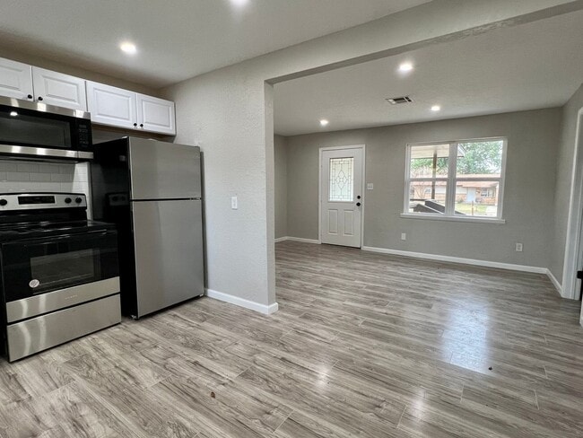 Building Photo - 4817 NW Pollard- COMING SOON!