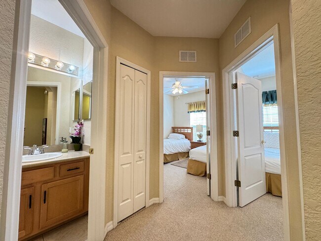 Building Photo - Fully Furnished 5-Bed End-Unit Townhome with Hot Tub in Gated Coral Cay! WASHER & DRYER INCLUDED!