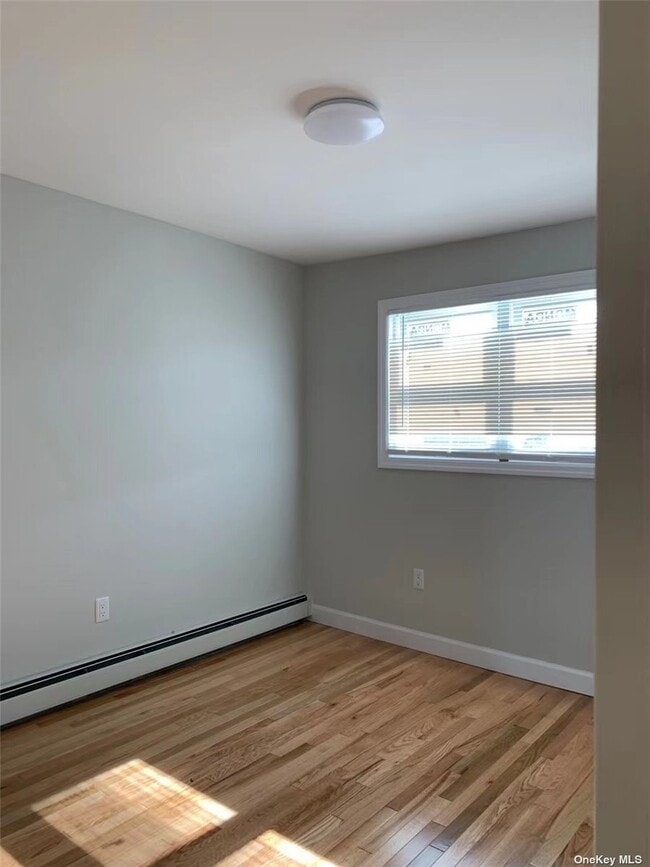 Building Photo - 71-32-71-58 58th Ave