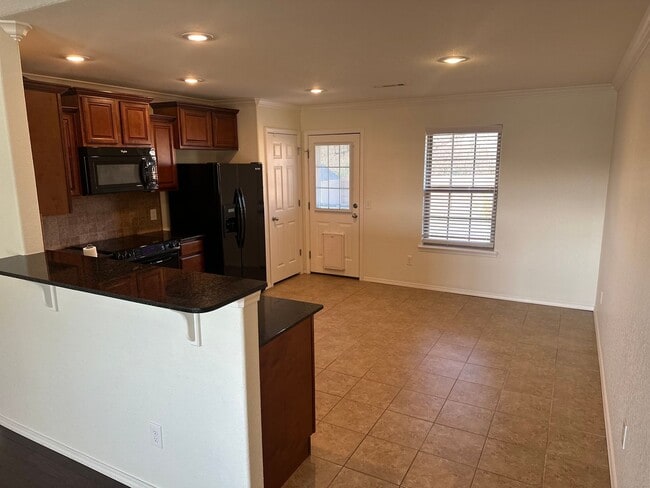 Building Photo - Available Now! Beautiful 4-Bedroom, 2-Bathroom Springdale Home w/ Fenced-In Yard and Covered Patio