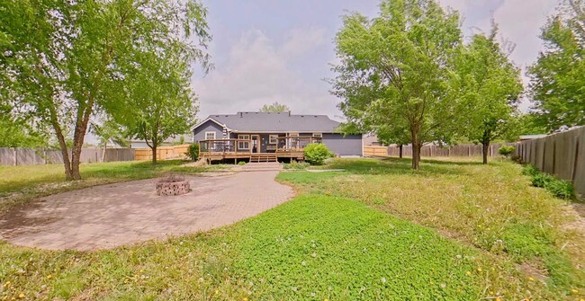 Building Photo - HUGE Backyard + Amazing Patio + Pet Friend...