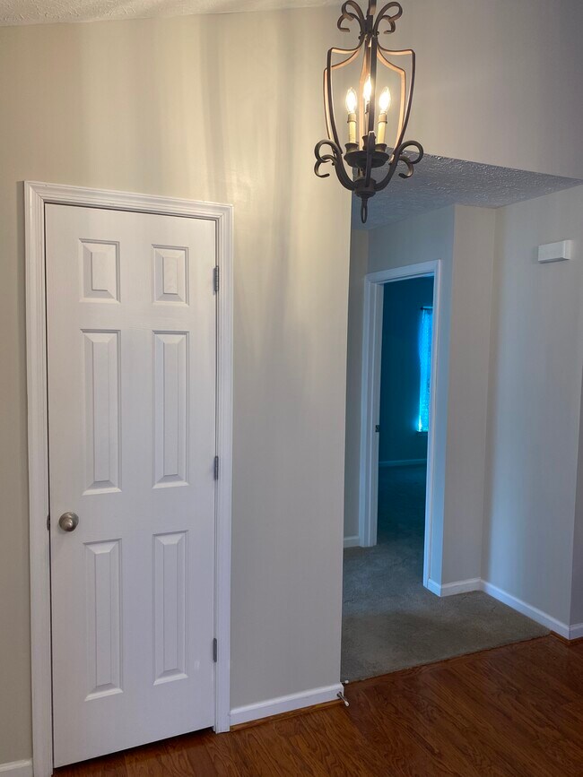 Hall to bedrooms - 709 Warmstone Ct