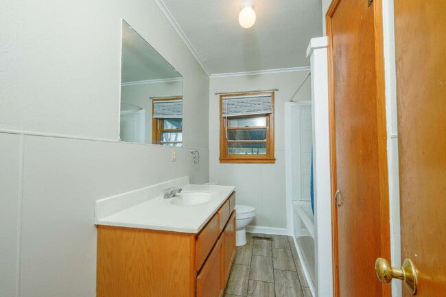 Building Photo - "Charming 3-Bedroom Greenfield Home with Gleaming Hardwood Floors – 1256 Sq Ft of Cozy Comfort!"