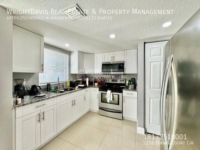 Building Photo - 5216 Tennis Ct Cir