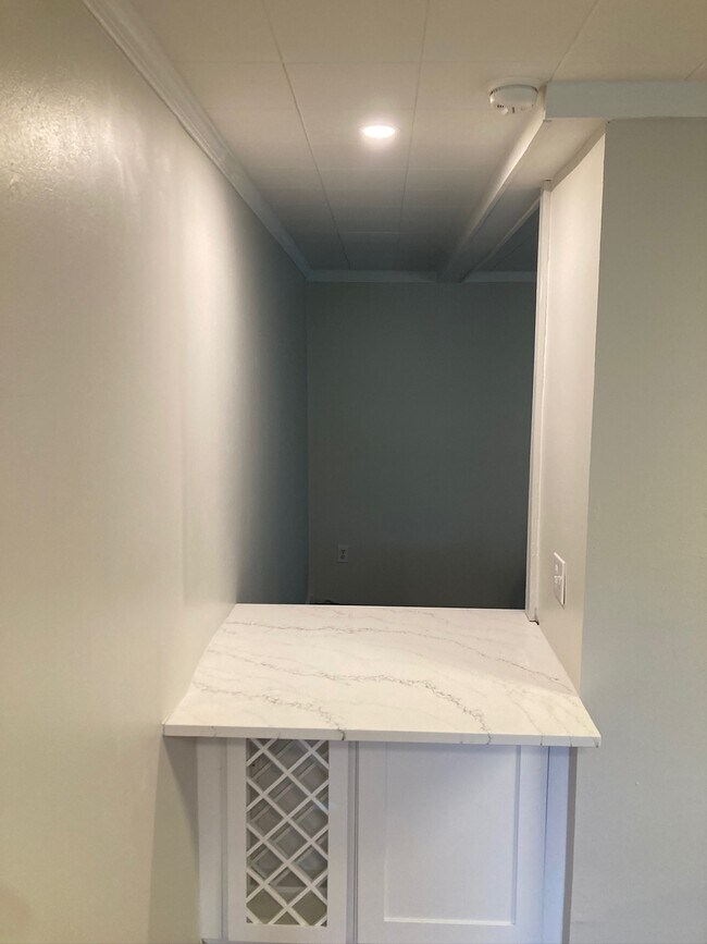 Breakfast nook/wine bar/work area with wine rack - 227 E Hector St