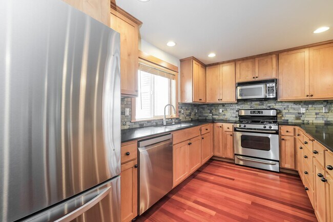 Building Photo - Bright and Spacious Residence with Vaulted Ceilings and Garage