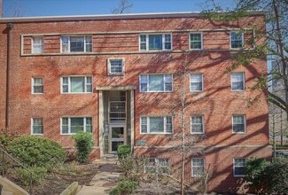 Building Photo - Beautiful corner unit in a secure, all-brick, pet-friendly building