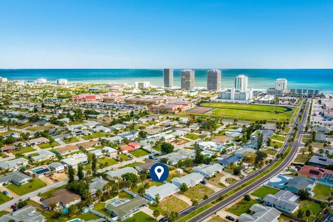 Building Photo - Welcome to your Perfect Beachside Retreat!