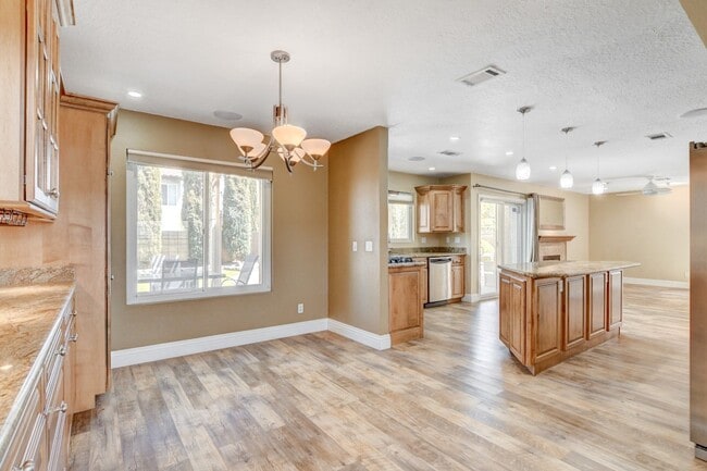 Building Photo - Gorgeous 4 Bedroom, 2 Story Home with a Beautiful Pool in the Lakes!