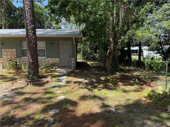 Building Photo - 7115 W Porpoise Dr