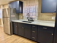 Building Photo - 2BR Duplex in Dyer - Designer Kitchen + Artisan Shower