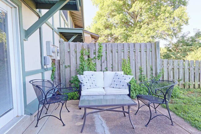 Building Photo - Spacious 3-Bedroom Attached Villa with Finished Basement & Private Fenced Yard!