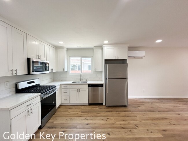 Building Photo - Welcome to your beautifully renovated sing...