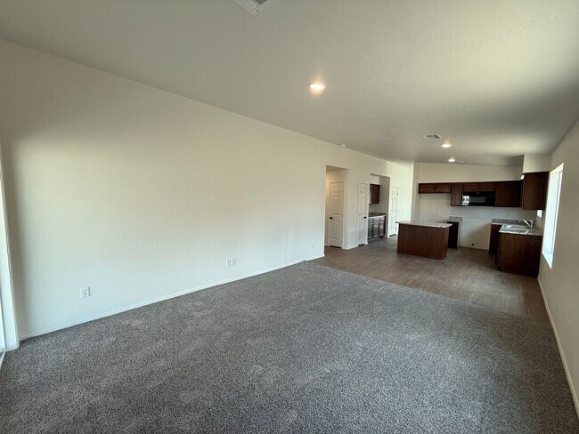 Building Photo - BRAND NEW 4 Bedroom in Desert Sands!