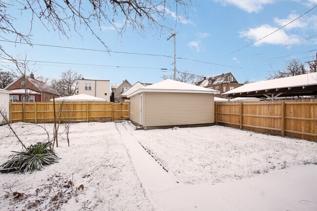 Building Photo - 7322 S Langley Ave