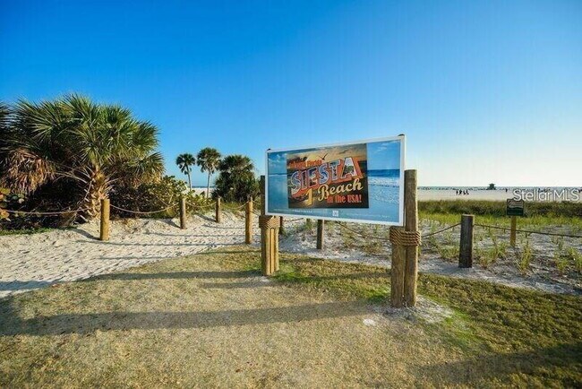 Building Photo - TURNKEY FURNISHED WATERFRONT RENTAL – Live the Island Life on Siesta Key