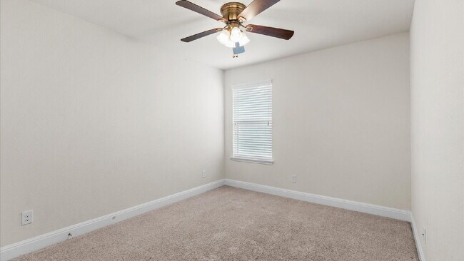 Building Photo - Spacious 4-Bedroom Home with a Backyard Oasis!
