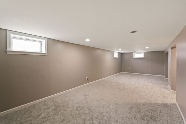 Building Photo - Move-In Ready Cape Cod with 3 Finished Levels & Huge Backyard