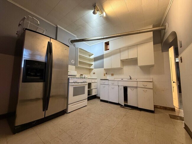 Building Photo - 11339 S Langley Ave