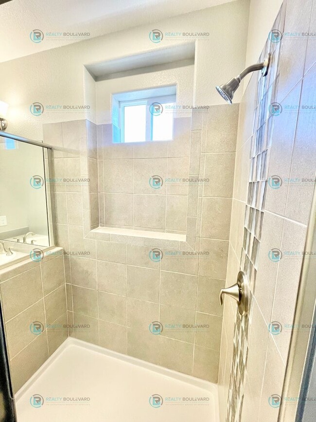 Building Photo - Discover luxurious living in this stunning 3-bedroom, 2-bathroom, 2-story condo, perfectly design...