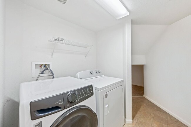 Building Photo - Bright & Spacious 4BR Tri-Level Home w/ Backyard + 2-Car Garage | Pool Access Included!