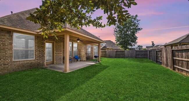 Building Photo - 22727 Whispering Timbers Way