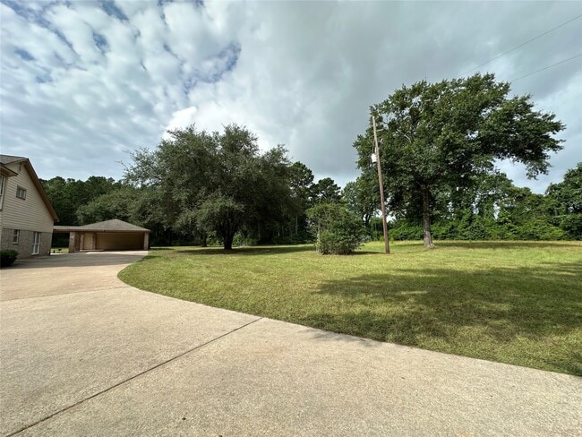 Building Photo - 33615 Dobbin-Huffsmith Rd