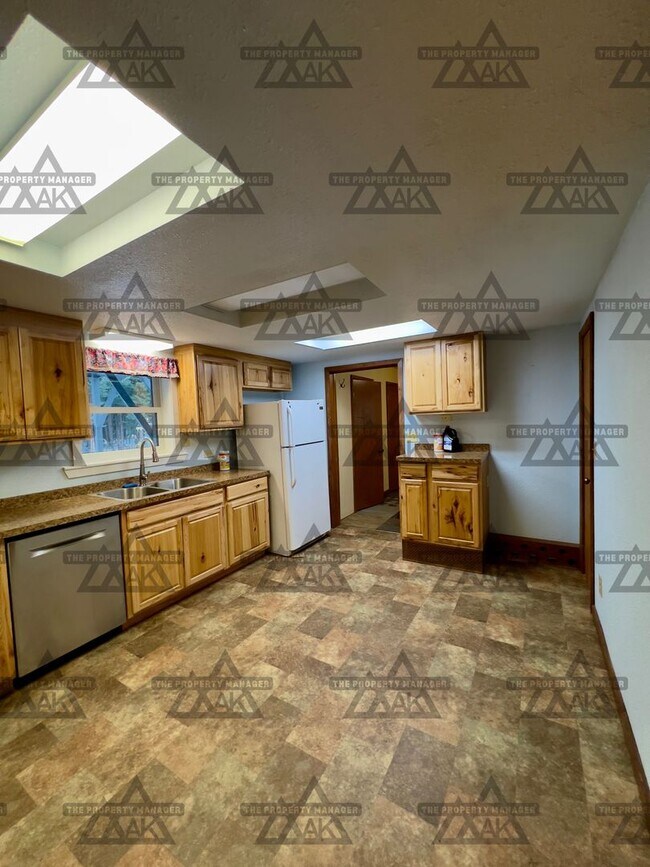 Building Photo - Spacious 3BR, 2.5BA Home off Chena Hot Springs Rd with Yard, Deck & Greenhouse