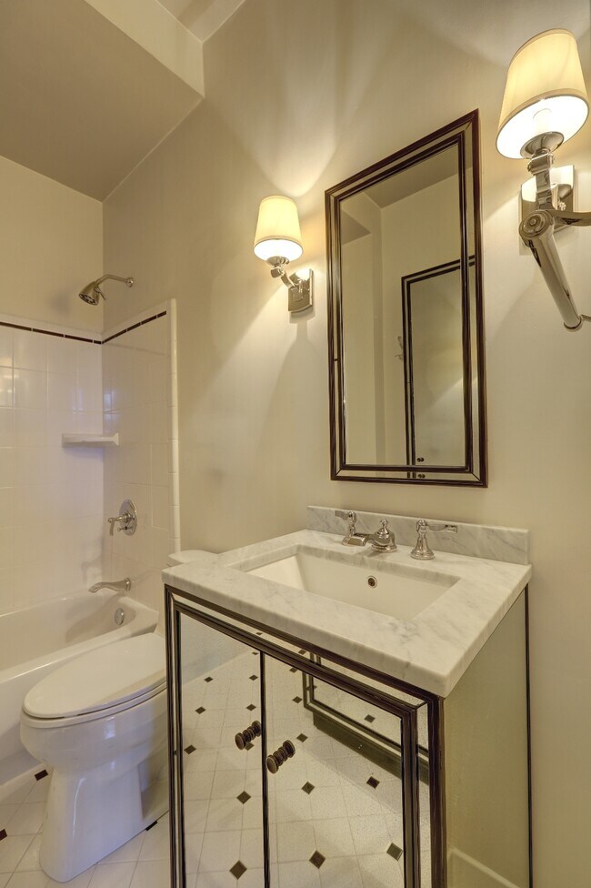Black and white bath with Restoration Hardware fixtures - 1 S Prado NE