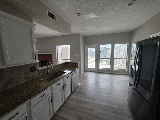 Building Photo - Spacious 4-Bedroom Home with Pool & Spa in...