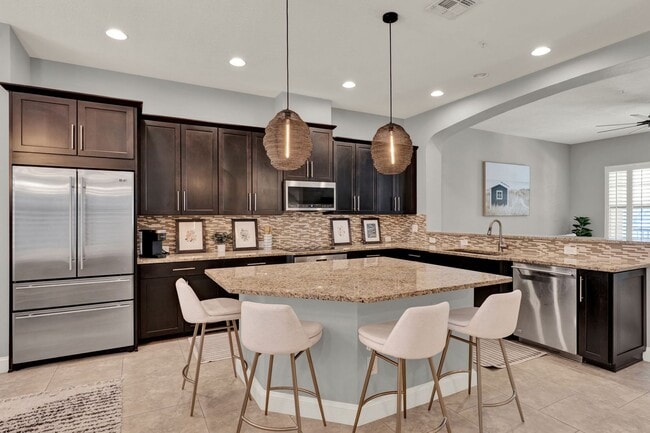 Building Photo - Stunning 3/3.5 Baldwin Park Townhome with 2-Car Garage & Upgrades Galore!