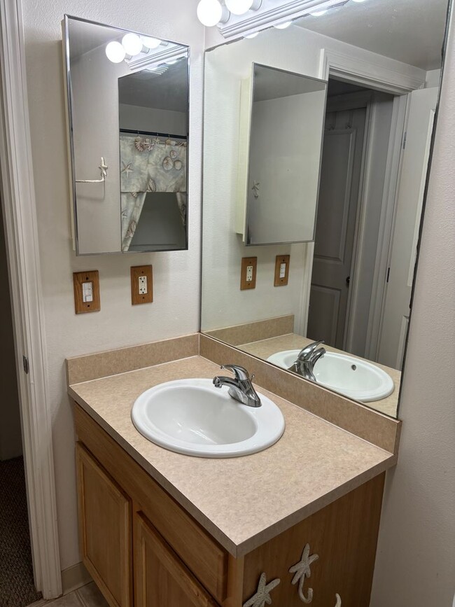 Building Photo - Move-In Ready 2BR/2BA Condo – Fully Furnished, AC, Washer/Dryer, 2 Parking stalls