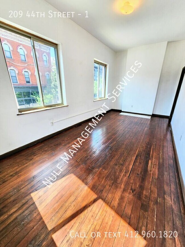 Building Photo - 209 44th St