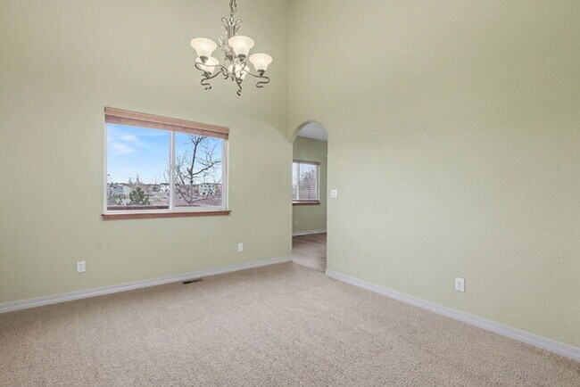 Building Photo - Spacious 5-Bedroom Home Backing to Open Space with Mountain Views