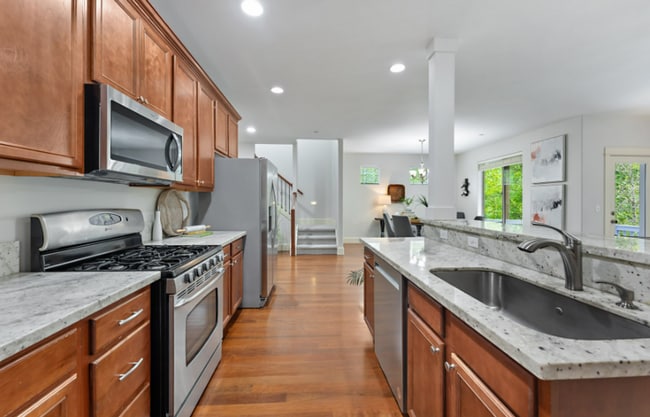 Building Photo - Spacious 5-Bedroom Retreat with Private Gr...