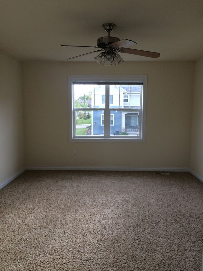 Building Photo - Live Large in This Spacious 2BR Townhome –...