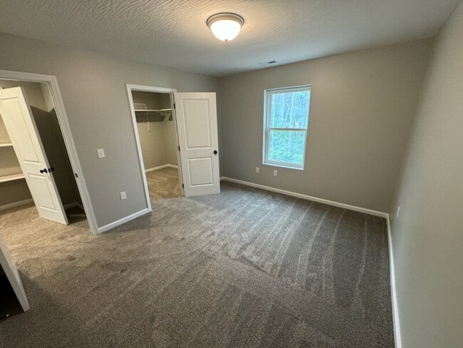 Building Photo - Brand-New 2 Bed / 1.5 Bath Townhome with Modern Finishes