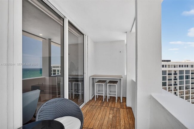 Building Photo - 10275 Collins Ave